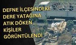 Defne ilçesindeki dere yatağına atık döken kişiler görüntülendi