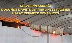 Alevlerin sardığı düğünde davetliler tehlikeye rağmen halay çekmeye devam etti