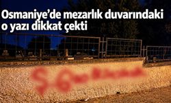 Osmaniye'de mezarlık duvarındaki o yazı dikkat çekti