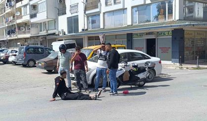 Bisikletli çocuğa çarpmamak için motosikletini devirip yaralandı