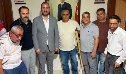 Osmaniye MHP’de Dikkat Çeken Ziyaret! Engellilerden Tuncer’e Tebrik