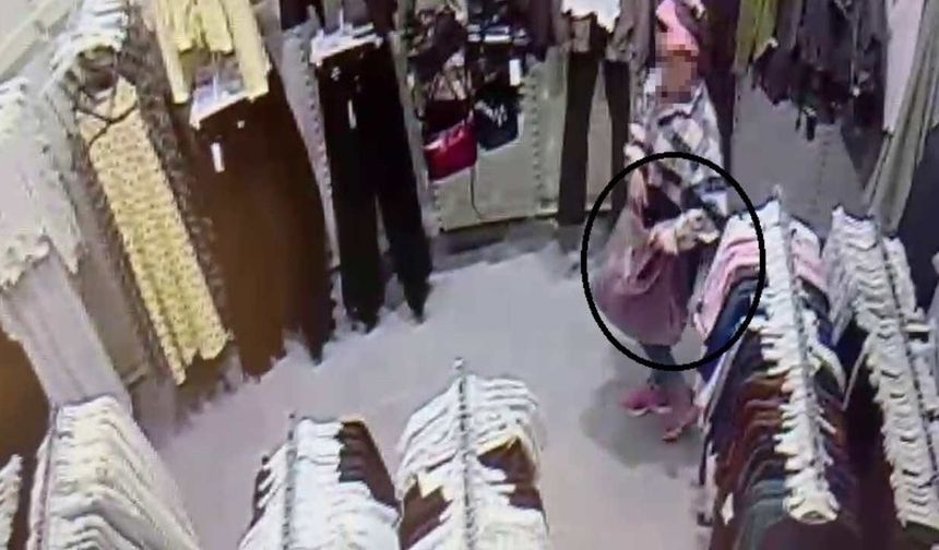 AVM’de çocuğunun yanında hırsızlık yaptı